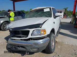 2003 Ford F-150 XLT with VIN 1FTRW08L63KA28964, listed as a IAAI auction lot 41689700 with 303,789 mi miles. Bid and sale history available at carsss.com. Image 18.