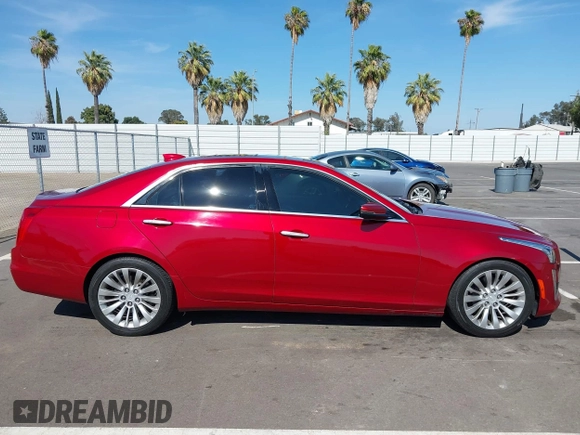 2015 Cadillac CTS Performance RWD with VIN 1G6AS5SX4F0136097, listed as a IAAI auction lot 42613633 with 173,103 mi miles and . Bid and sale history available at DreamBid. Image 13.