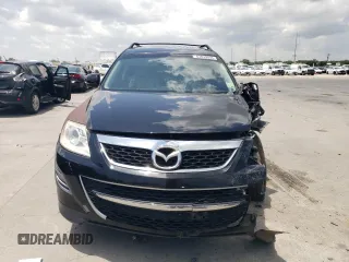 2012 Mazda CX-9 Grand Touring with VIN JM3TB2DA4C0361023, listed as a Copart auction lot 63839005 with 140,784 mi miles and Salvage title. Bid and sale history available at DreamBid. Image 5.