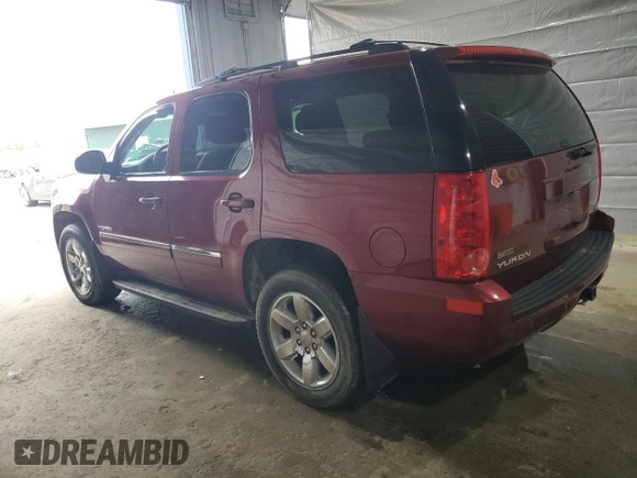2011 GMC Yukon SLT with VIN 1GKS2CE06BR200400, listed as a Copart auction lot 50156125 with 203,008 mi miles and Salvage Title. Bid and sale history available at DreamBid. Image 2.