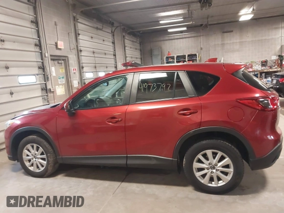 2013 Mazda CX-5 Touring with VIN JM3KE4CEXD0120913, listed as a IAAI auction lot 41973792 with 129,202 mi miles. Bid and sale history available at carsss.com. Image 14.