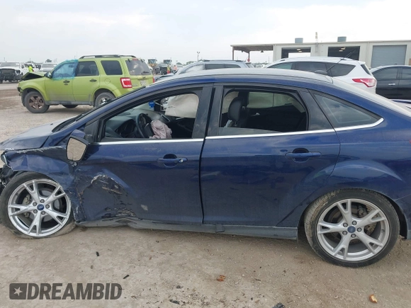 2016 Ford Focus Titanium with VIN 1FADP3J21GL404602, listed as a IAAI auction lot 42270177 with 118,369 mi miles and . Bid and sale history available at DreamBid. Image 15.