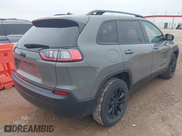 2023 Jeep Cherokee Altitude Lux with VIN 1C4PJMMB5PD114674, listed as a IAAI auction lot 42129076 with 54,269 mi miles. Bid and sale history available at carsss.com. Image 4.