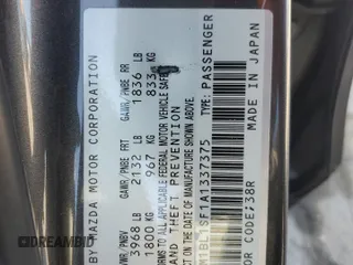 2010 Mazda 3 i Touring with VIN JM1BL1SF1A1337375, listed as a Copart auction lot 54787395 with 118,148 mi miles and Salvage Title. Bid and sale history available at DreamBid. Image 12.