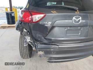 2016 Mazda CX-5 Touring with VIN JM3KE4CY4G0779827, listed as a IAAI auction lot 41840727 with 91,367 mi miles. Bid and sale history available at carsss.com. Image 6.