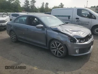 2014 Volkswagen Jetta GLI with VIN 3VW4T7AJ3EM352712, listed as a Copart auction lot 59582825 with 145,765 mi miles and Salvage title. Bid and sale history available at DreamBid. Image 4.