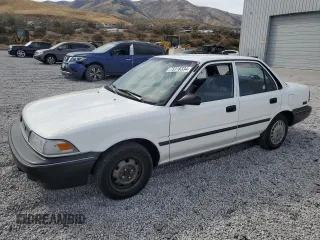 1990 Toyota Corolla z VIN 1NXAE94A0LZ089770, wystawiony jako Copart lot #75318334 z przebiegiem 161 894 mil mil oraz Szkoda całkowita • Salvage title. Historia ofert i sprzedaży dostępna na DreamBid. Obrazek 1.