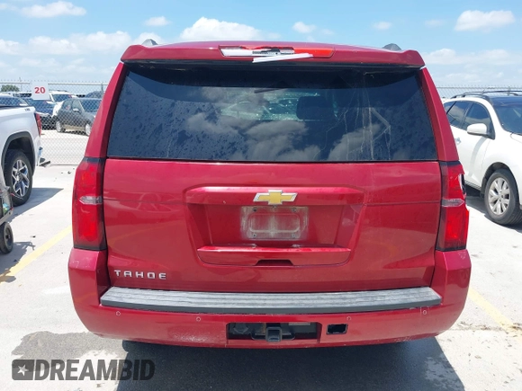 2015 Chevrolet Tahoe LS with VIN 1GNSCAEC4FR121571, listed as a IAAI auction lot 42499156 with 131,284 mi miles and . Bid and sale history available at DreamBid. Image 16.