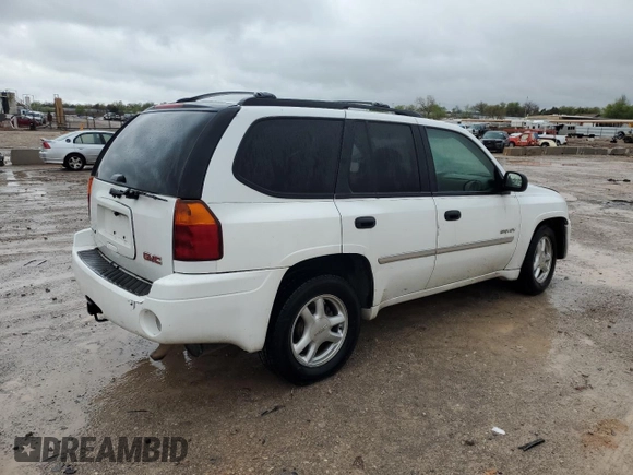2006 GMC Envoy SLE z VIN 1GKDT13S562124794, wystawiony jako Copart lot #51649085 z przebiegiem 152 844 mil mil oraz Szkoda całkowita • Salvage title. Historia ofert i sprzedaży dostępna na DreamBid. Obrazek 3.