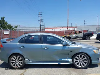 2008 Mitsubishi Lancer GTS z VIN JA3AU86U38U021896, wystawiony jako IAAI lot #42294311 z przebiegiem 188 937 mil mil oraz . Historia ofert i sprzedaży dostępna na DreamBid. Obrazek 12.