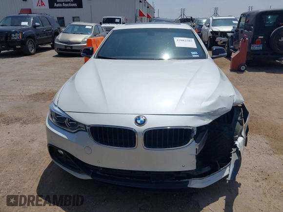 2015 BMW 4 Series 435i z VIN WBA3R1C58FK194626, wystawiony jako IAAI lot #42082585 z przebiegiem 70 619 mil mil oraz . Historia ofert i sprzedaży dostępna na DreamBid. Obrazek 12.