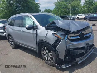 2022 Honda Pilot Elite with VIN 5FNYF6H08NB030669, listed as a IAAI auction lot 42537378 with 70,169 mi miles and . Bid and sale history available at DreamBid. Image 1.