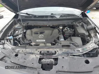2017 Mazda CX-9 Touring z VIN JM3TCACY7H0129335, wystawiony jako IAAI lot #42289926 z przebiegiem 60 425 mil mil oraz . Historia ofert i sprzedaży dostępna na DreamBid. Obrazek 10.