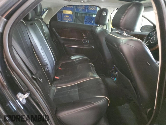 2014 Jaguar XJ with VIN SAJWA1CZ0E8V61168, listed as a Copart auction lot 54383215 with 137,724 mi miles and Salvage Title. Bid and sale history available at DreamBid. Image 10.