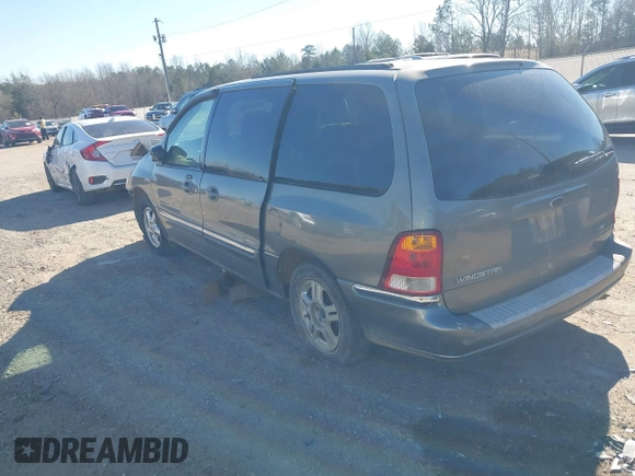 2003 Ford Windstar SE with VIN 2FMZA52473BB65706, listed as a IAAI auction lot 41300897 with 160,965 mi miles and . Bid and sale history available at DreamBid. Image 3.