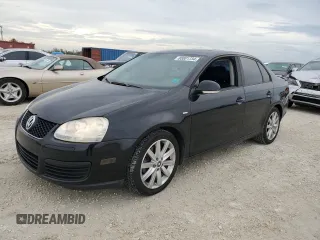 2010 Volkswagen Jetta Wolfsburg Edition with VIN 3VWRJ7AJ0AM051515, listed as a Copart auction lot 80001734 with 133,192 mi miles and Salvage title. Bid and sale history available at DreamBid. Image 1.