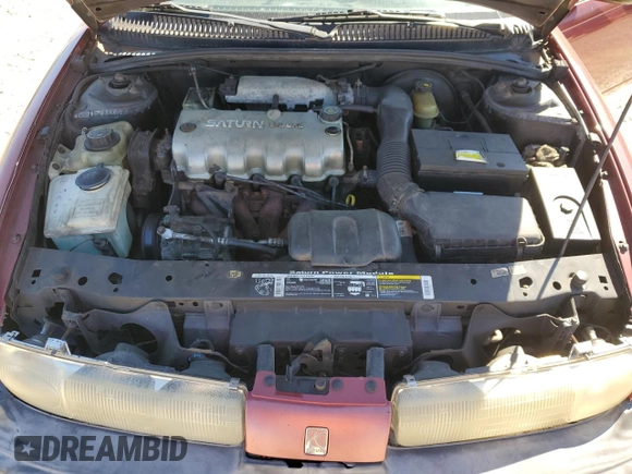 1998 Saturn SL z VIN 1G8ZH528XWZ144301, wystawiony jako Copart lot #75918414 z przebiegiem 219 256 mil mil oraz Szkoda całkowita • Salvage title. Historia ofert i sprzedaży dostępna na DreamBid. Obrazek 13.