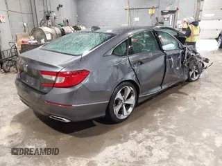 2019 Honda Accord Touring with VIN 1HGCV2F99KA031634, listed as a IAAI auction lot 41209019 with 74,965 mi miles and . Bid and sale history available at DreamBid. Image 4.