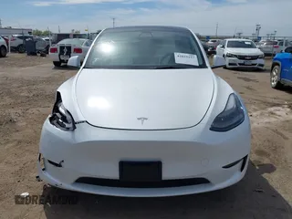 2021 Tesla Model Y Performance z VIN 5YJYGDEF7MF277769, wystawiony jako IAAI lot #42025157 z przebiegiem 28 522 mil mil oraz . Historia ofert i sprzedaży dostępna na DreamBid. Obrazek 11.