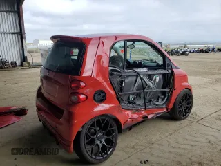 2009 Smart fortwo Pure with VIN WMEEJ31X79K249060, listed as a Copart auction lot 56927145 with Not provided miles and Salvage title. Bid and sale history available at DreamBid. Image 3.