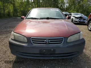 2001 Toyota Camry LE z VIN JT2BF22K610295178, wystawiony jako Copart lot #68538524 z przebiegiem 507 822 mil mil oraz Szkoda całkowita • Salvage title. Historia ofert i sprzedaży dostępna na DreamBid. Obrazek 5.
