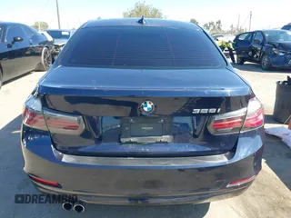 2015 BMW 3 Series 328i with VIN WBA3C1C50FK124300, listed as a IAAI auction lot 40112372 with 142,591 mi miles and . Bid and sale history available at carsss.com. Image 16.