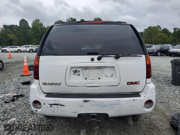 2005 GMC Envoy SLT with VIN 1GKDS13S652330496, listed as a Copart auction lot 73317234 with 191,138 mi miles and Salvage Title. Bid and sale history available at DreamBid. Image 6.