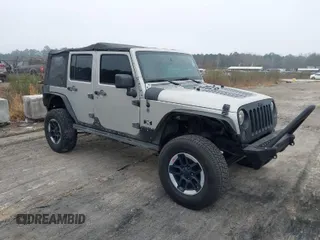 2007 Jeep Wrangler Unlimited X with VIN 1J4GA391X7L107424, listed as a IAAI auction lot 41752013 with 196,557 mi miles and . Bid and sale history available at DreamBid. Image 1.