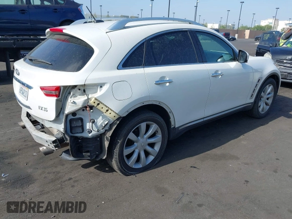 2011 Infiniti FX35 with VIN JN8AS1MU0BM111357, listed as a IAAI auction lot 42031638 with 162,396 mi miles. Bid and sale history available at carsss.com. Image 4.