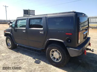 2005 Hummer H2 SUV with VIN 5GRGN23U65H108432, listed as a Copart auction lot 76786844 with 248,780 mi miles and Salvage Title. Bid and sale history available at carsss.com. Image 2.