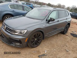 2020 Volkswagen Tiguan SE with VIN 3VV3B7AX7LM163193, listed as a IAAI auction lot 41751571 with 32,352 mi miles and . Bid and sale history available at DreamBid. Image 18.
