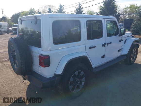 2018 Jeep Wrangler Unlimited Sahara z VIN 1C4HJXEG9JW227829, wystawiony jako IAAI lot #42099356 z przebiegiem 130 259 mil mil oraz . Historia ofert i sprzedaży dostępna na DreamBid. Obrazek 4.