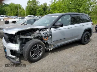 2022 Jeep Grand Cherokee Trailhawk with VIN 1C4RJYC62N8715910, listed as a Copart auction lot 58785405 with 21,976 mi miles and Salvage title. Bid and sale history available at DreamBid. Image 1.