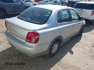 2000 Toyota ECHO with VIN JTDBT1236Y0028488, listed as a IAAI auction lot 42228033 with 246,702 mi miles and . Bid and sale history available at DreamBid. Image 4.