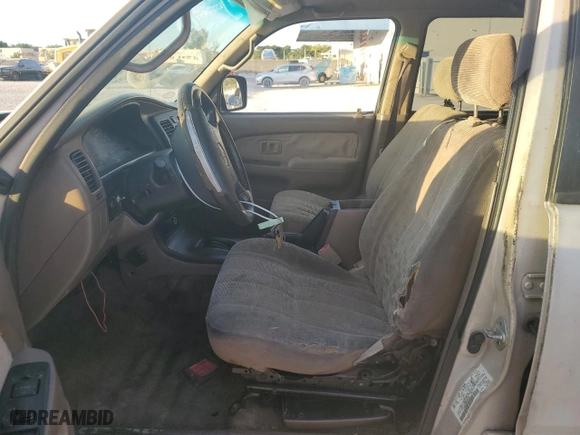 2000 Toyota 4Runner with VIN JT3GM84RXY0063021, listed as a Copart auction lot 82144274 with 310,186 mi miles and Salvage Title. Bid and sale history available at carsss.com. Image 7.