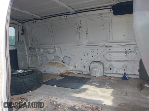 2011 Ford Econoline Cargo Commercial with VIN 1FTNE2EW7BDA51829, listed as a IAAI auction lot 42698973 with 197,907 mi miles and . Bid and sale history available at DreamBid. Image 8.