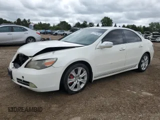 2009 Acura RL Technology z VIN JH4KB26679C002297, wystawiony jako Copart lot #57774755 z przebiegiem 214 766 mil mil oraz Szkoda całkowita • Salvage title. Historia ofert i sprzedaży dostępna na DreamBid. Obrazek 1.