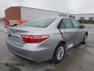 2017 Toyota Camry Hybrid LE with VIN 4T1BD1FK5HU214476, listed as a IAAI auction lot 41537972 with 66,313 mi miles. Bid and sale history available at carsss.com. Image 4.