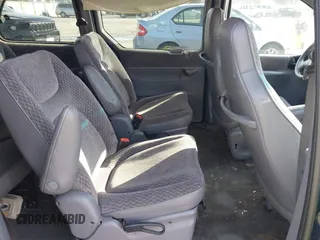 2000 Dodge Caravan SE with VIN 2B4GP45R9YR661145, listed as a IAAI auction lot 41819130 with 233,411 mi miles and . Bid and sale history available at DreamBid. Image 8.