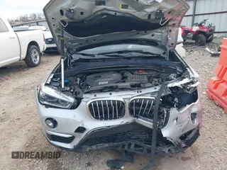 2019 BMW X1 sDrive28i with VIN WBXHU7C52K3H44360, listed as a IAAI auction lot 41709431 with 56,432 mi miles. Bid and sale history available at carsss.com. Image 10.