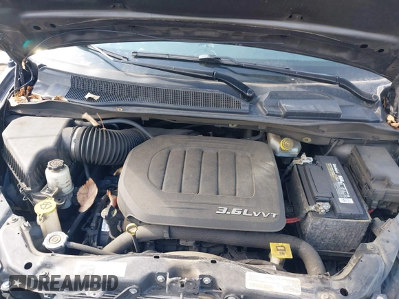 2019 Dodge Grand Caravan SXT with VIN 2C4RDGCG1KR514123, listed as a IAAI auction lot 41777811 with 119,087 mi miles and . Bid and sale history available at DreamBid. Image 10.