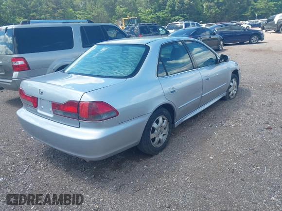 2002 Honda Accord EX z VIN 1HGCG56622A013090, wystawiony jako IAAI lot #42132291 z przebiegiem 152 567 mil mil oraz . Historia ofert i sprzedaży dostępna na DreamBid. Obrazek 4.