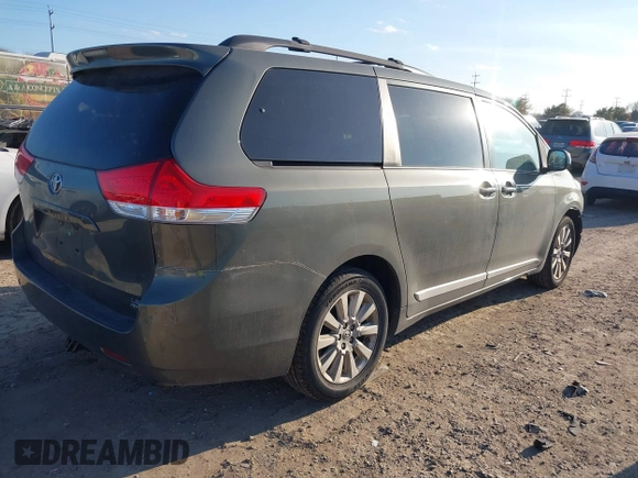 2012 Toyota Sienna LE with VIN 5TDJK3DCXCS039801, listed as a IAAI auction lot 41483248 with 165,548 mi miles. Bid and sale history available at carsss.com. Image 4.