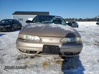 2002 Oldsmobile Alero GL1 z VIN 1G3NL12F02C285787, wystawiony jako Copart lot #41392325 z przebiegiem 75 401 mil mil oraz Tytuł czysty. Historia ofert i sprzedaży dostępna na DreamBid. Obrazek 5.