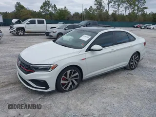 2020 Volkswagen Jetta GLI S with VIN 3VW6T7BU8LM058477, listed as a IAAI auction lot 41504769 with 121,419 mi miles and . Bid and sale history available at DreamBid. Image 17.