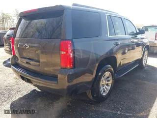 2016 Chevrolet Tahoe LS with VIN 1GNSKAKC0GR193571, listed as a IAAI auction lot 41974878 with 194,039 mi miles. Bid and sale history available at carsss.com. Image 4.
