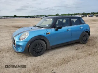 2017 MINI Hardtop 4 Door Cooper z VIN WMWXU1C55H2E18599, wystawiony jako Copart lot #52110415 z przebiegiem 63 753 mil mil oraz Szkoda całkowita • Salvage title. Historia ofert i sprzedaży dostępna na DreamBid. Obrazek 1.