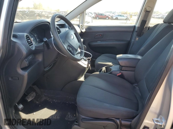 2009 Kia Rondo LX Base with VIN KNAFG528097261085, listed as a Copart auction lot 73094904 with 95,287 mi miles and Salvage Title. Bid and sale history available at carsss.com. Image 7.