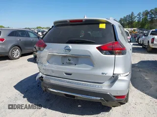 2019 Nissan Rogue SV with VIN 5N1AT2MT6KC787285, listed as a IAAI auction lot 42049656 with 93,639 mi miles and . Bid and sale history available at DreamBid. Image 16.