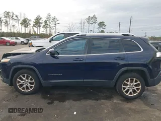 2014 Jeep Cherokee Latitude with VIN 1C4PJLCS2EW228418, listed as a IAAI auction lot 41416407 with 154,192 mi miles. Bid and sale history available at carsss.com. Image 14.